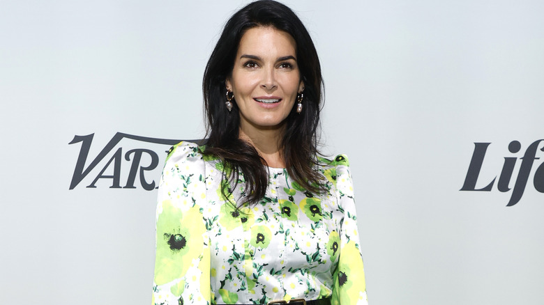 Angie Harmon smiles