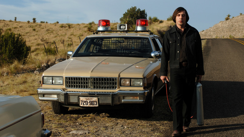 Anton Chigurh walks forward