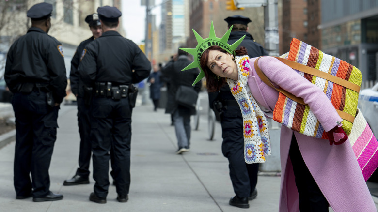 Elsbeth standing near cops