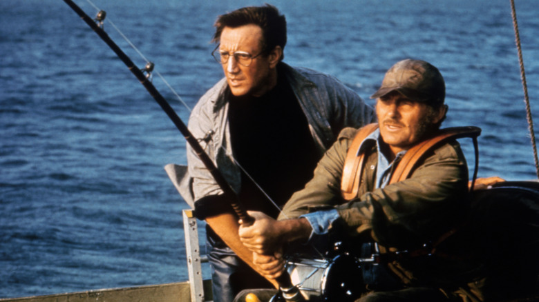 Quint and Martin Brody holding onto fishing pole in Jaws (1975)