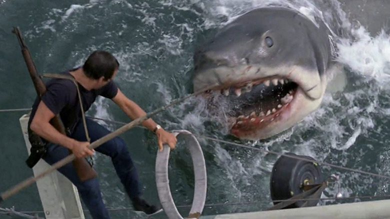 Martin Brody battles the shark as his ship sinks in Jaws (1975)