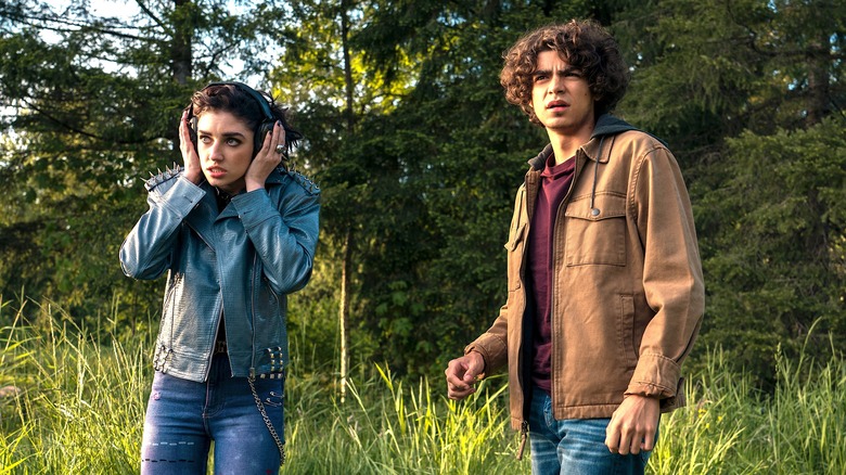 Tilda and Juan standing in field