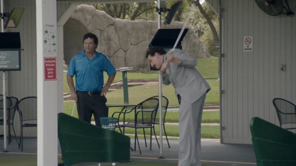 Borat tries his hand at golfing in Arlington, Texas in Borat 2