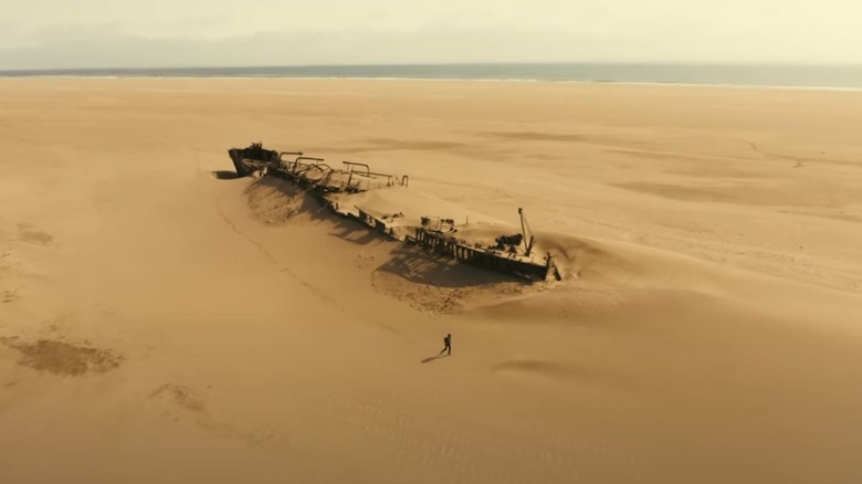 Shipwreck in sandy desert