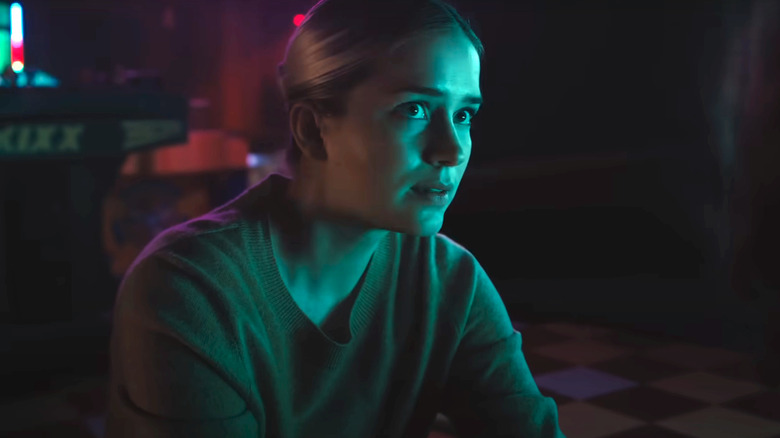 Elizabeth Lail in blue light