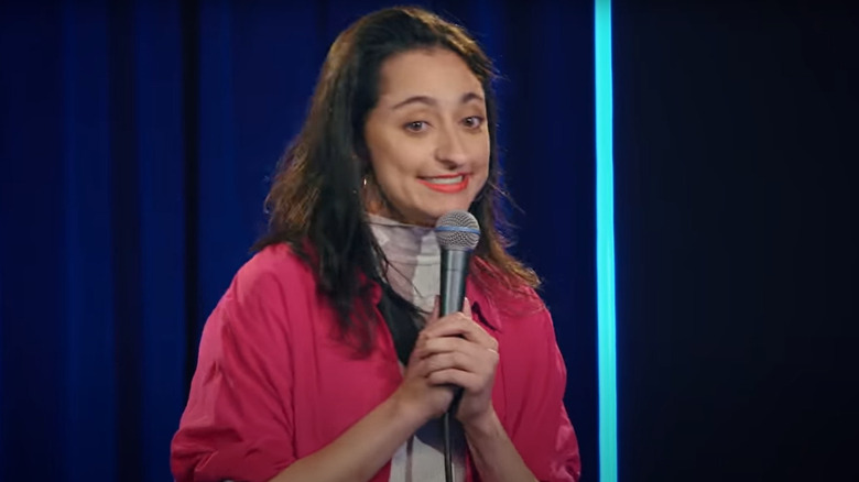 Mitra Jouhari doing standup