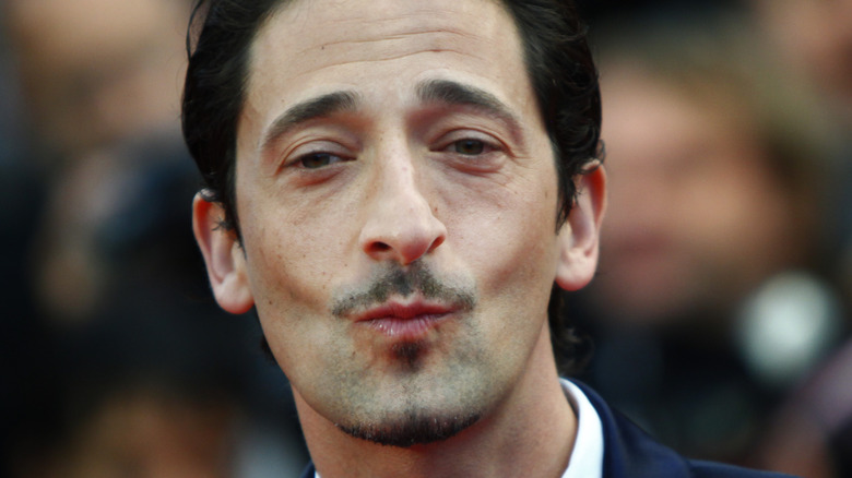 Adrien Brody making kiss face