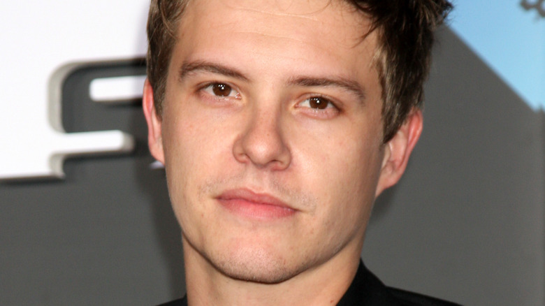 Xavier Samuel staring