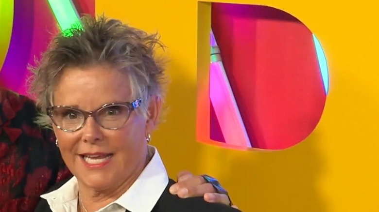 Amanda Bearse in suit at premiere