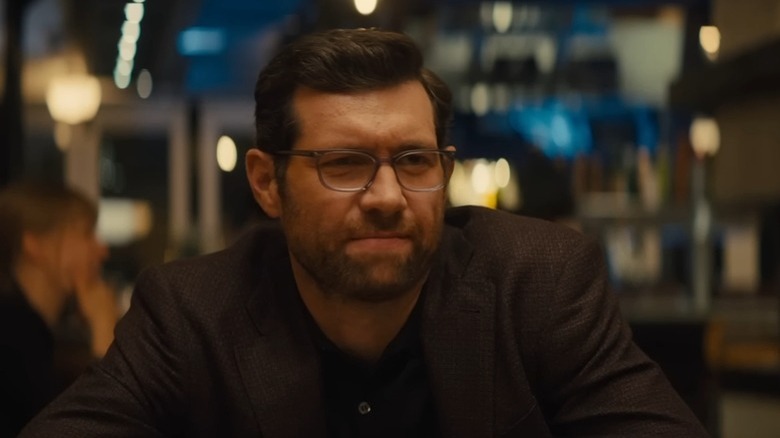 Billy Eichner as Bobby at dinner