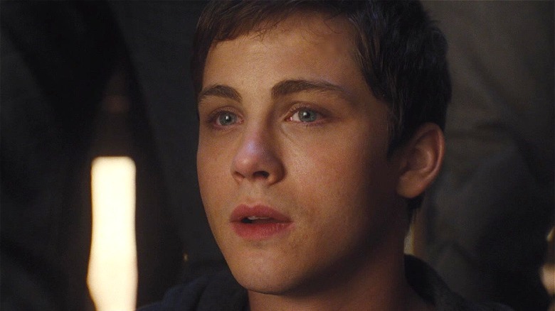 Logan Lerman looking at someone