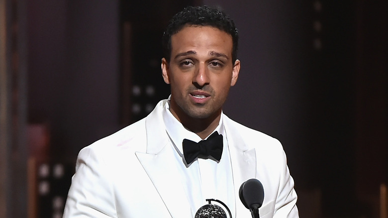 Ari'el Stachel holding his Tony award