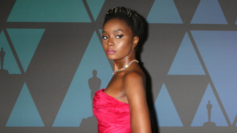 KiKi Layne on an Oscars event red carpet