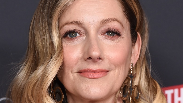 Judy Greer with golden hoop earrings