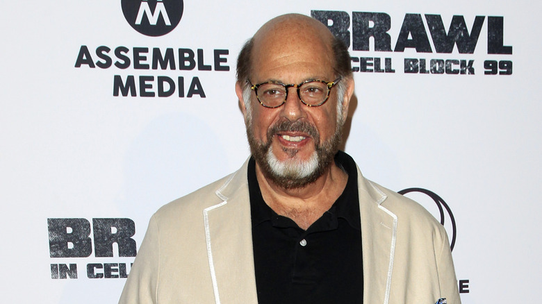 Fred Melamed smiling at premiere