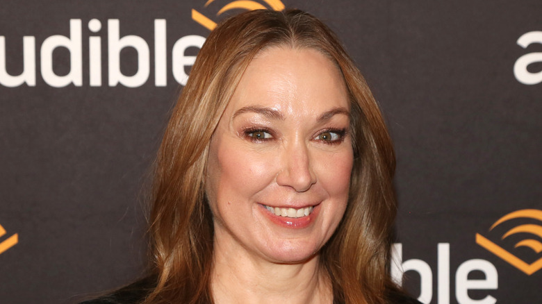 Elizabeth Marvel offers a broad smile