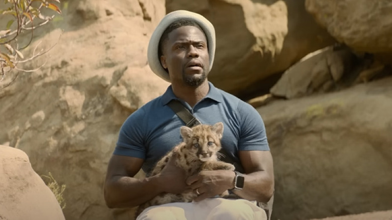 Sonny Fisher holding baby cougar