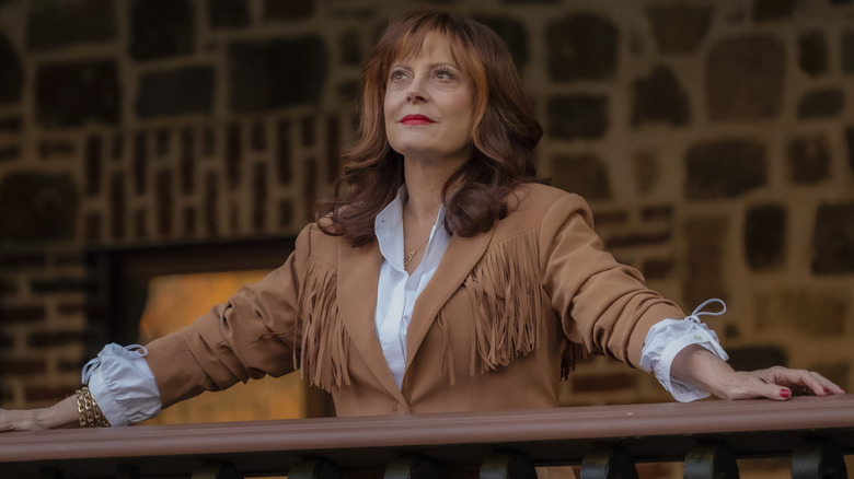 Susan Sarandon stands on a balcony in "Monarch"