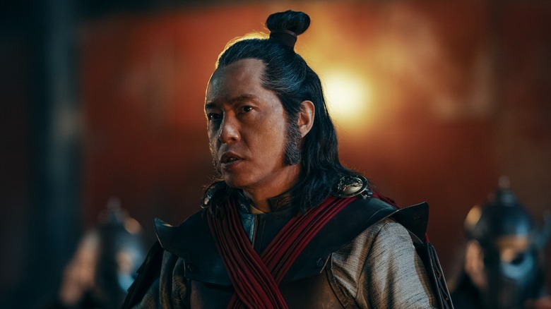 Commander Zhao frowning and speaking