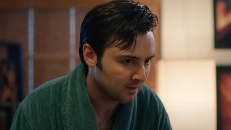 John in bathrobe