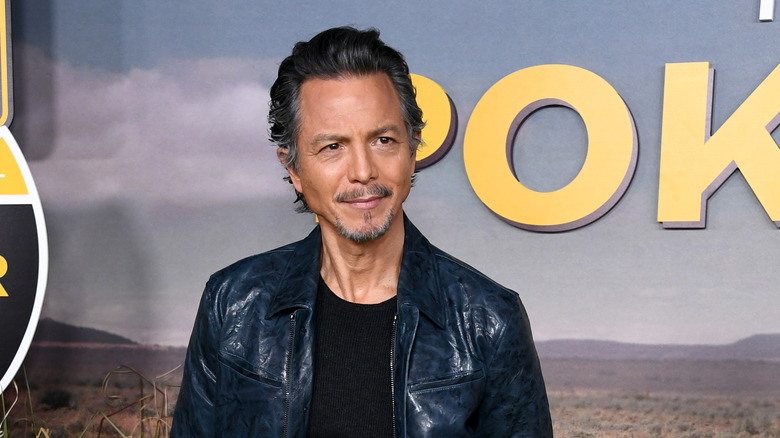 Benjamin Bratt wearing leather jacket