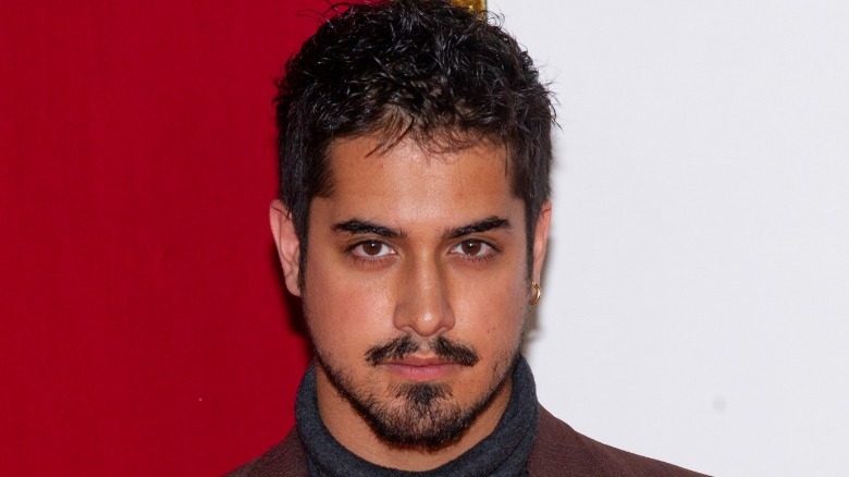 Avan Jogia looking serious