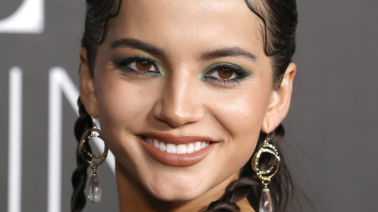 Isabela Merced wearing dangling earrings