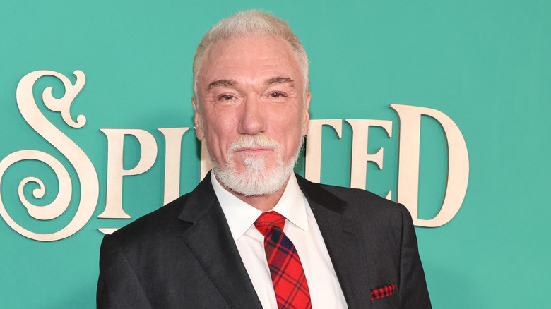 Patrick Page wearing a checkered tie