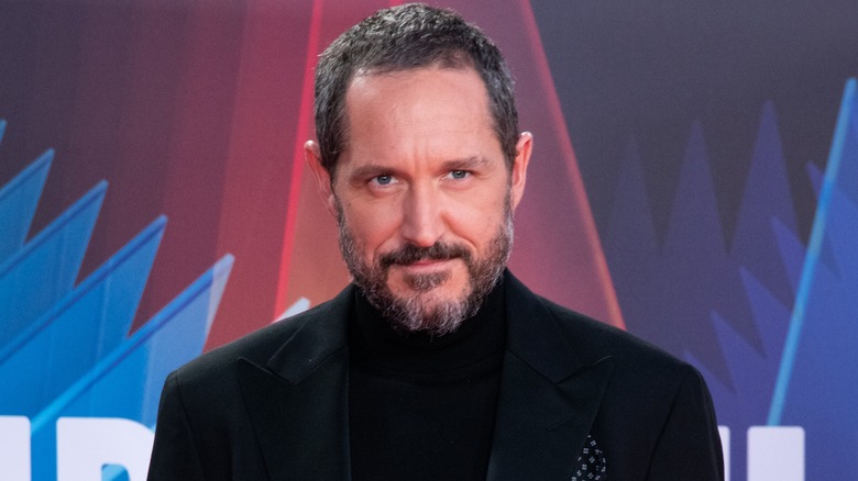 Bertie Carvel wearing black suit