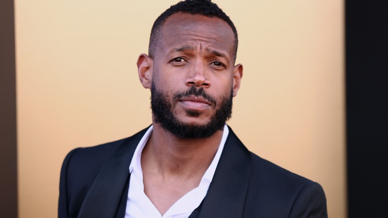 Marlon Wayans wearing a suit