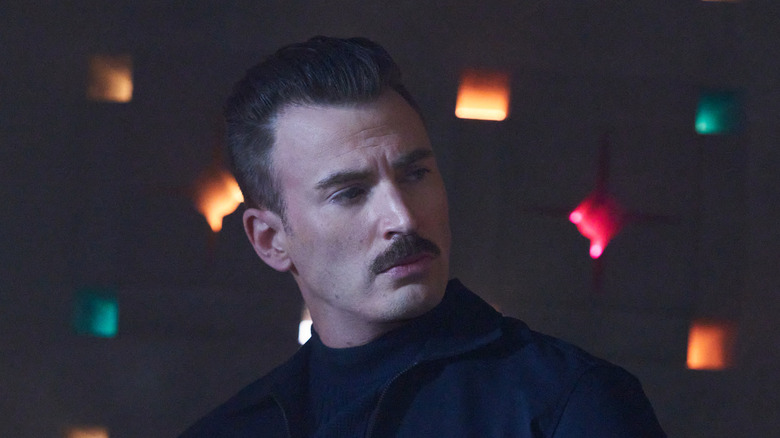 Chris Evans with a mustache as Lloyd Hansen in The Gray Man.