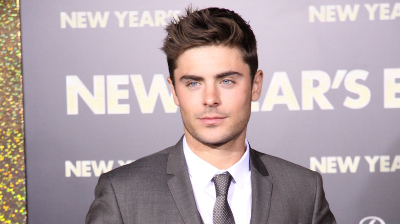 Zac Efron standing