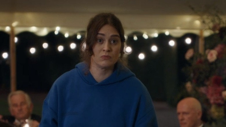Lizzy Caplan as Marissa in The People We Hate at the Wedding