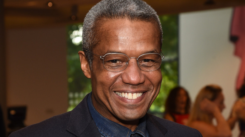 Hugh Quarshie wearing glasses