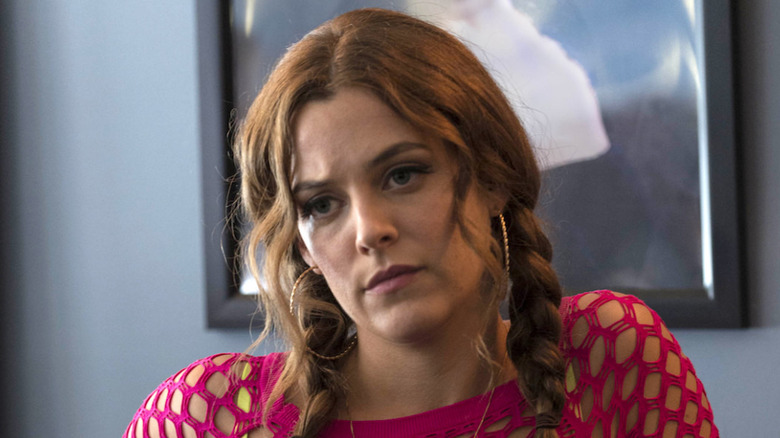 Riley Keough looking disappointed in Logan Lucky