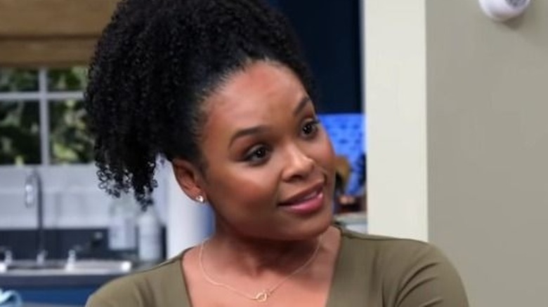 Demetria McKinney tilting head to the side