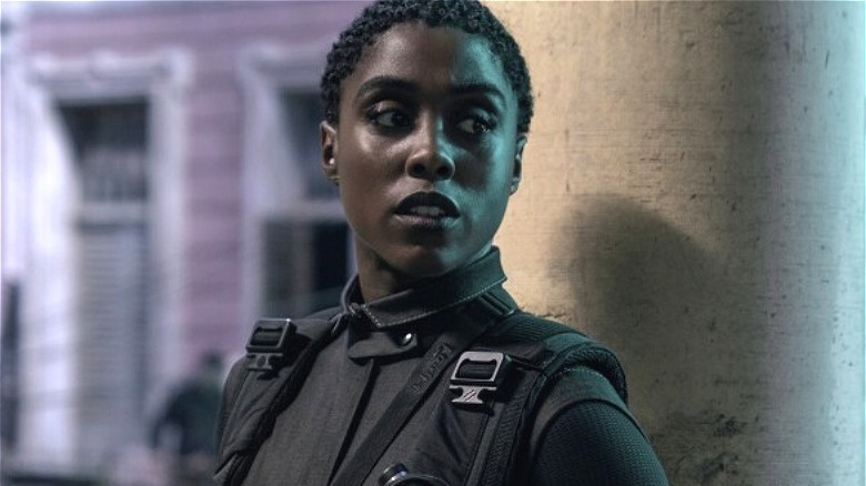 Lashana Lynch looking at something