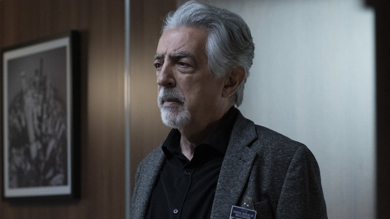 Joe Mantegna as Rossi looking concerned