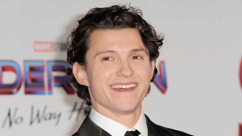 Tom Holland, smiling