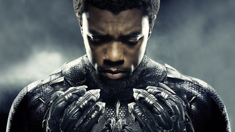 Chadwick Boseman T'CHalla solemn looking down