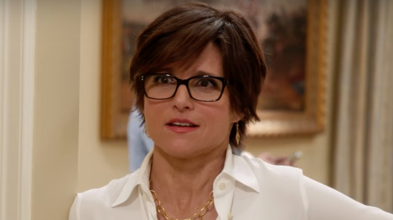 Selina Meyer forcing a smile