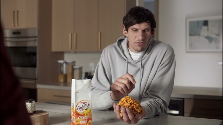 Boban Marjanović holds Goldfish crackers