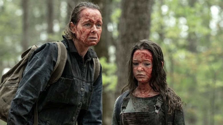 Alpha and her daughter contemplating their survival as Whisperers on The Walking Dead