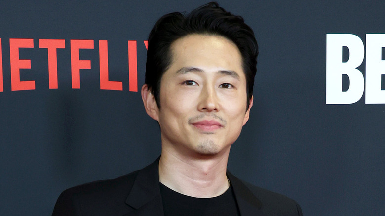 Steven Yeun smiling