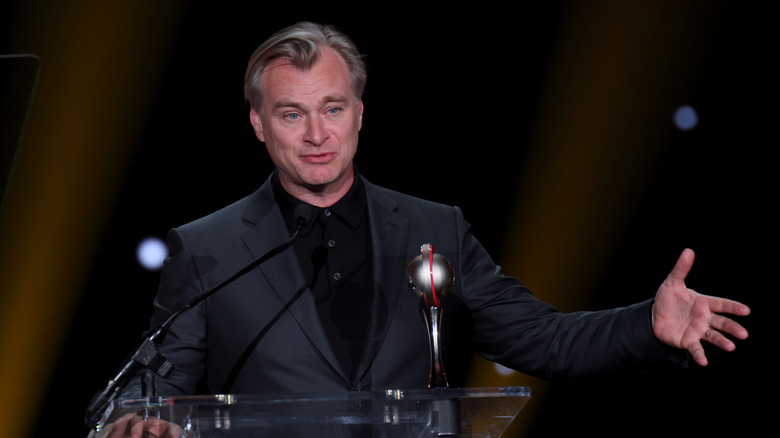 Christopher Nolan accepts an award at CinemaCon 2023