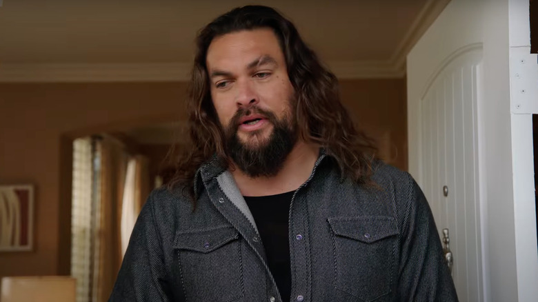 Jason Momoa standing in doorway