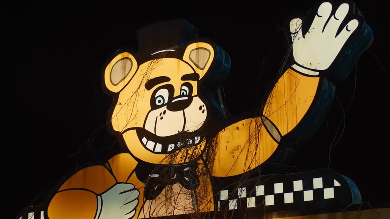 A brightly lit Freddy Fazbear's Pizza sign