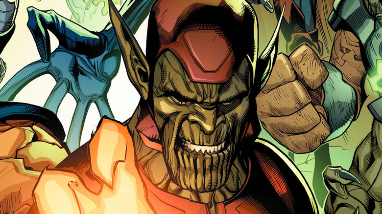 Skrull with a glowing gauntlet surrounded by other Skrulls