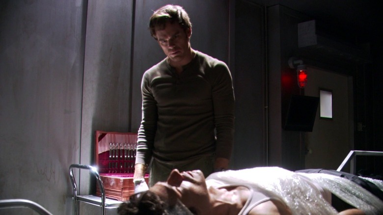 Dexter stands at kill table 