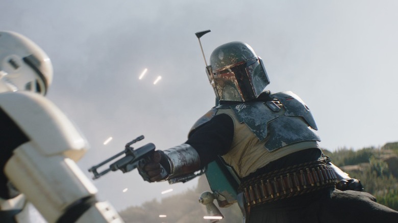 Boba Fett shooting a stormtrooper